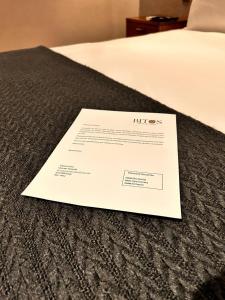 Postel nebo postele na pokoji v ubytování Bito's Hotel Boutique