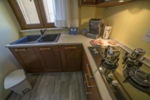 A kitchen or kitchenette at B&B Porta Livorno