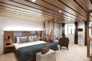 Кровать или кровати в номере Apartments Alter Pfarrhof
