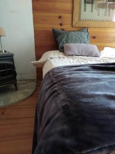 Cama o camas de una habitación en Grand confort à La Ferme de Jal