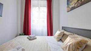 Postel nebo postele na pokoji v ubytování Porta Nuova - Centro Elegante Suite con Wi-Fi