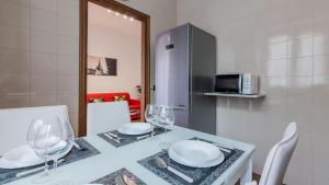 Kuchyň nebo kuchyňský kout v ubytování Porta Nuova - Centro Elegante Suite con Wi-Fi