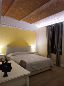 Postel nebo postele na pokoji v ubytování Ultroneo, Locanda di collina
