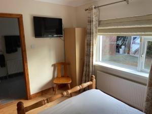 Ліжко або ліжка в номері Padua Guest Accommodation Rosslare