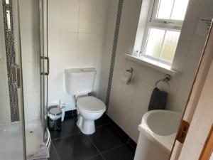 Ванна кімната в Padua Guest Accommodation Rosslare