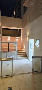 a room with stairs and a stair case in a building at Option Full Service Residence in Rio de Janeiro
