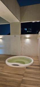 a large circle on the floor of a room at Option Full Service Residence in Rio de Janeiro
