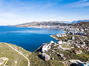 an aerial view of a town next to a body of water at Villa La Quiete - Adults only in Ksamil