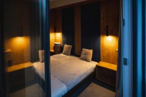 Katil atau katil-katil dalam bilik di Apartament Loft Mazury