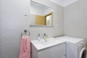 Koupelna v ubytování Apartments Goga