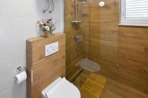Koupelna v ubytování Apartments Goga