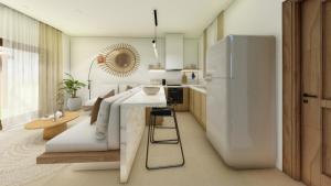 a kitchen with a white refrigerator and a counter at Elite Luxury Villas in Afiartis