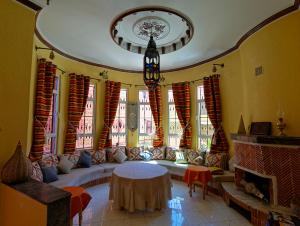 Posezení v ubytování Riad Parfums de OUARZAZATE