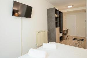 TV a/nebo společenská místnost v ubytování Hotel dell'Angelo