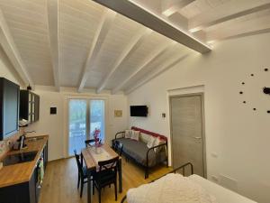 TV a/nebo společenská místnost v ubytování Il Casaletto - Guest House