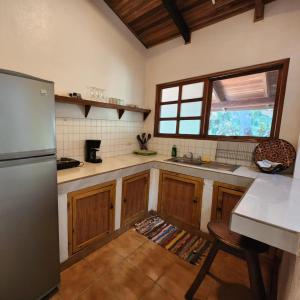 Kuchyň nebo kuchyňský kout v ubytování Villas Pura Vibra