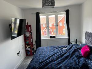 a bedroom with a bed and a window at 119 in Wrockwardine