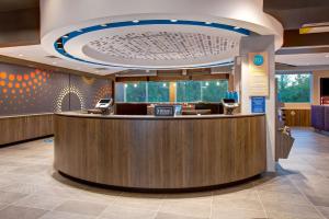 a lobby with a reception counter in a hospital at Tru By Hilton Northlake Fort Worth, Tx in Northlake