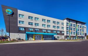 a building with a sign on the side of it at Tru By Hilton Lexington University Medical Center, Ky in Lexington