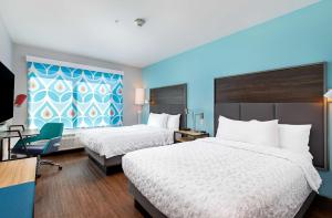 Tru By Hilton Lexington University Medical Center, Ky客房内的一张或多张床位