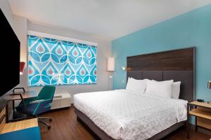 Tru By Hilton Lexington University Medical Center, Ky客房内的一张或多张床位