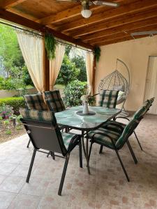 a patio table and chairs on a patio at Dioklecian Dream Apartment in Split