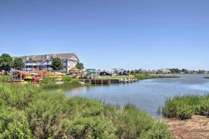 a river with a bunch of boats docked on it at Bethany Bay - 37434 Pettinaro Dr #4805 in Ocean View