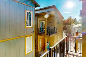 a view of a house with a balcony at The Pines in Flagstaff