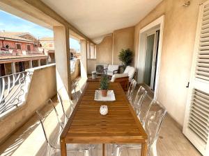 En balkon eller terrasse på Casa Efix - Residence Il Gabbiano