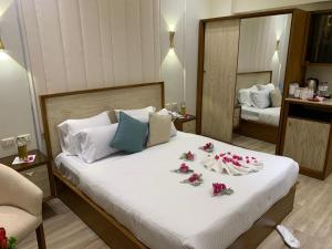 Voodi või voodid majutusasutuse Ramage Hotel & Resort toas