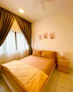 a bedroom with a bed and a window at Youth City 2 Bedroom Pool View by DKAY in Nilai in Nilai