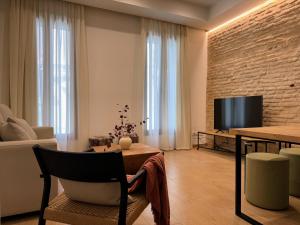 TV a/nebo společenská místnost v ubytování Redes Royale Apartments by Misterhost