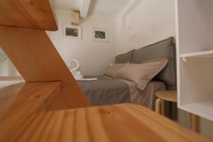 Un ou plusieurs lits dans un hébergement de l'établissement La Casetta di Babbo