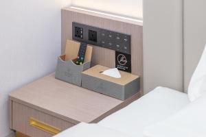 a rendering of a room with a cash register at Poltton International Hotel - Huizhou University of economics in Huizhou
