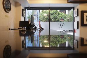 ティファナにあるHotel Wellintownのギャラリーの写真