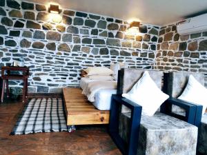 Voodi või voodid majutusasutuse Gusto Accommodation toas