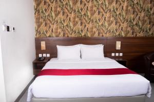 Katil atau katil-katil dalam bilik di Pakons Prime Hotel