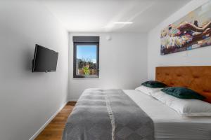 Ένα ή περισσότερα κρεβάτια σε δωμάτιο στο New! Villa Mir with private pool, 3 bedrooms, 7km from sandy beach +41 φωτογραφίες