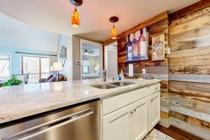 a kitchen with a sink and a counter at Oaks Paradise in Galena