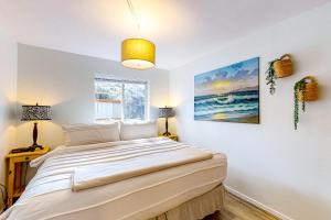 Postel nebo postele na pokoji v ubytování Sunset Port