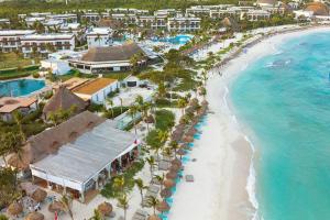 an aerial view of a beach with a resort at Akumal Skies Private Terrace W Jacuzzi W Sea Views Walk To Beach in Akumal