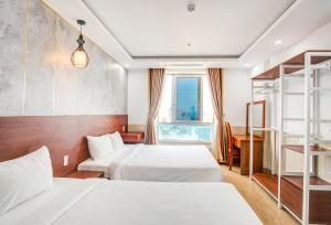 Postel nebo postele na pokoji v ubytování Phan Van 2 hotel + 37 fotografií