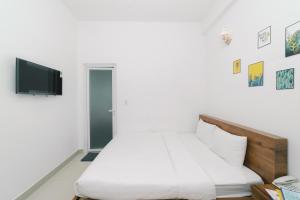 TV a/nebo společenská místnost v ubytování Mat Troi Vang Dalat Hotel