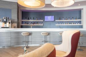 Lounge oder Bar in der Unterkunft IntercityHotel Kiel