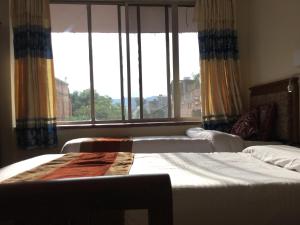 Uma cama ou camas num quarto em Trekkers Home