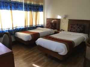 Uma cama ou camas num quarto em Trekkers Home