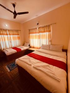 Vuode tai vuoteita majoituspaikassa Hotel Global Inn