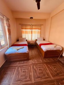 Vuode tai vuoteita majoituspaikassa Hotel Global Inn