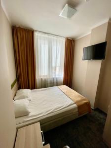 Postel nebo postele na pokoji v ubytování eMKa Hostel