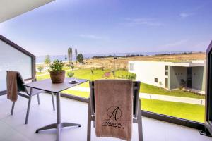 Балкон или терраса в Ammoa Luxury Hotel & Spa Resort